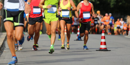 male and female during the run of the marathon race