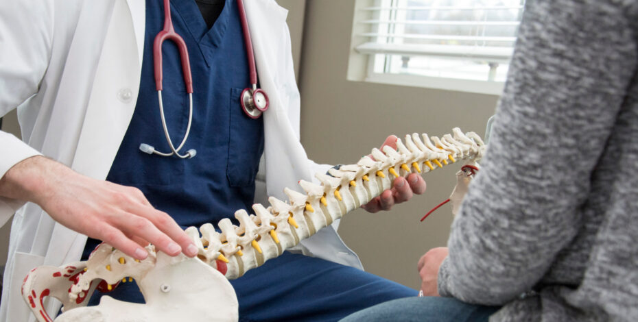 doctor talking to patient about their Chiropractic care