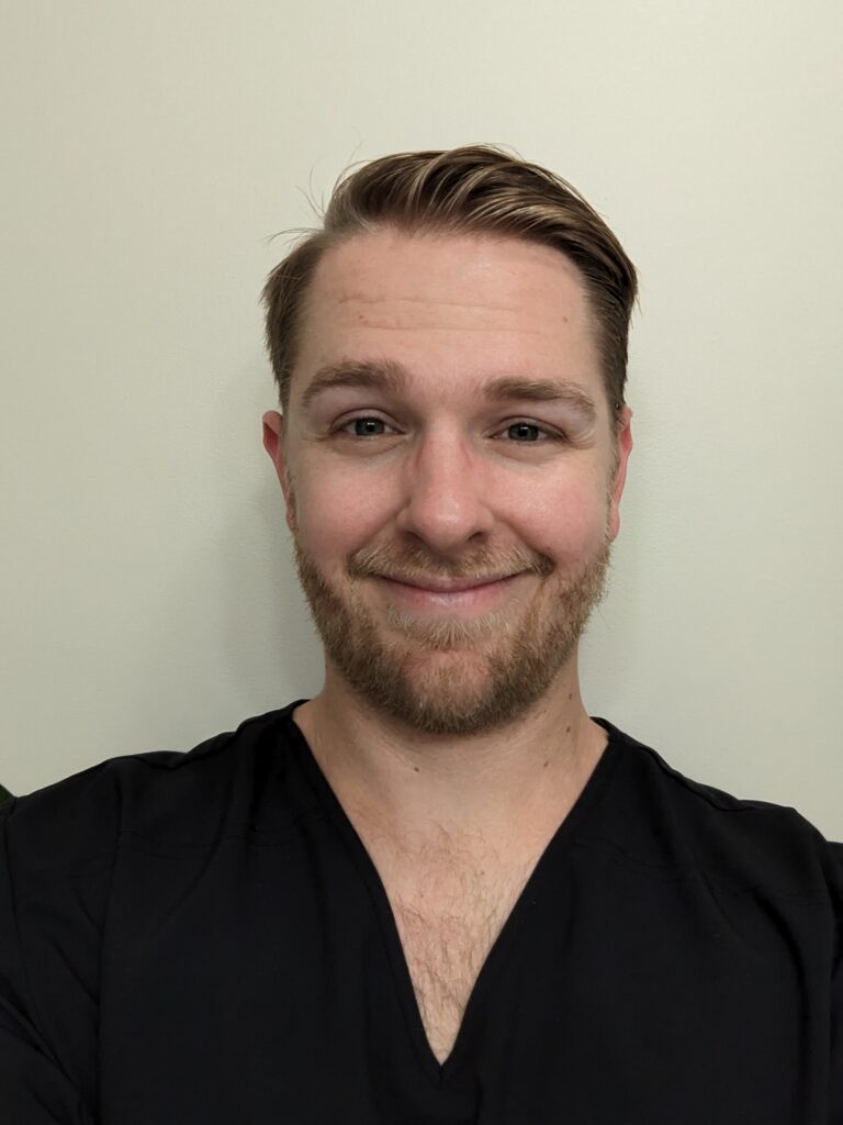 Dr. Ethan Ames, a chiropractor at Total Health Systems