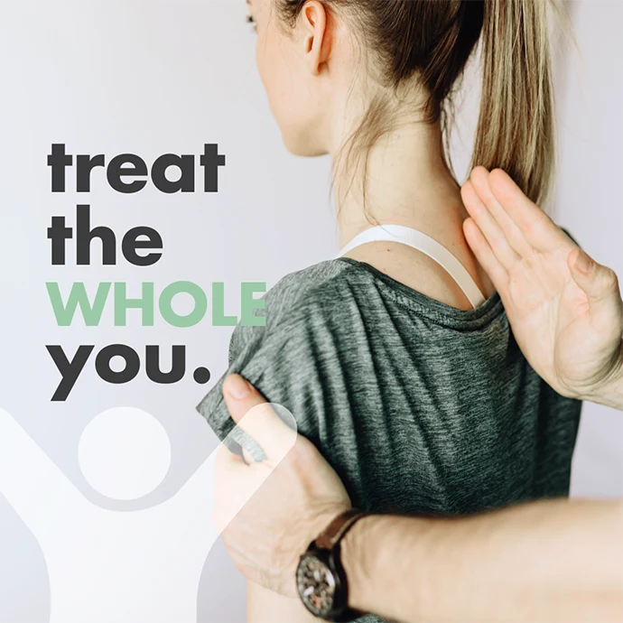 Chiropractor aligning woman's back with 'Treat the Whole You' text
